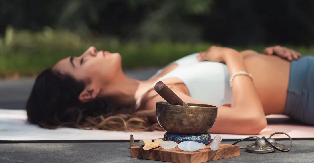 People resting during a guided breathwork and sound session